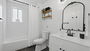 Hair dryer, towels, soap, toilet paper