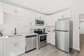 Private kitchen - Depot Town 2BR Townhouse: Workspace & Sleep 4 (Ypsilanti)