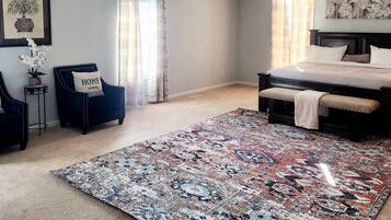 Tabla de planchar con plancha, wifi y ropa de cama