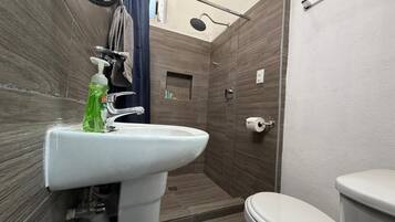 Shower, hair dryer, towels, soap