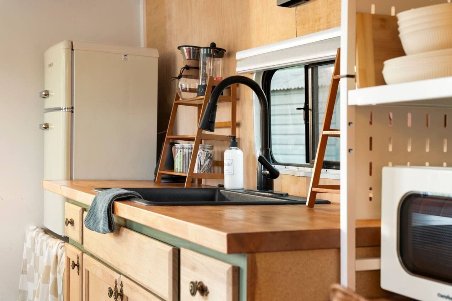 Fridge, microwave, stovetop, coffee/tea maker
