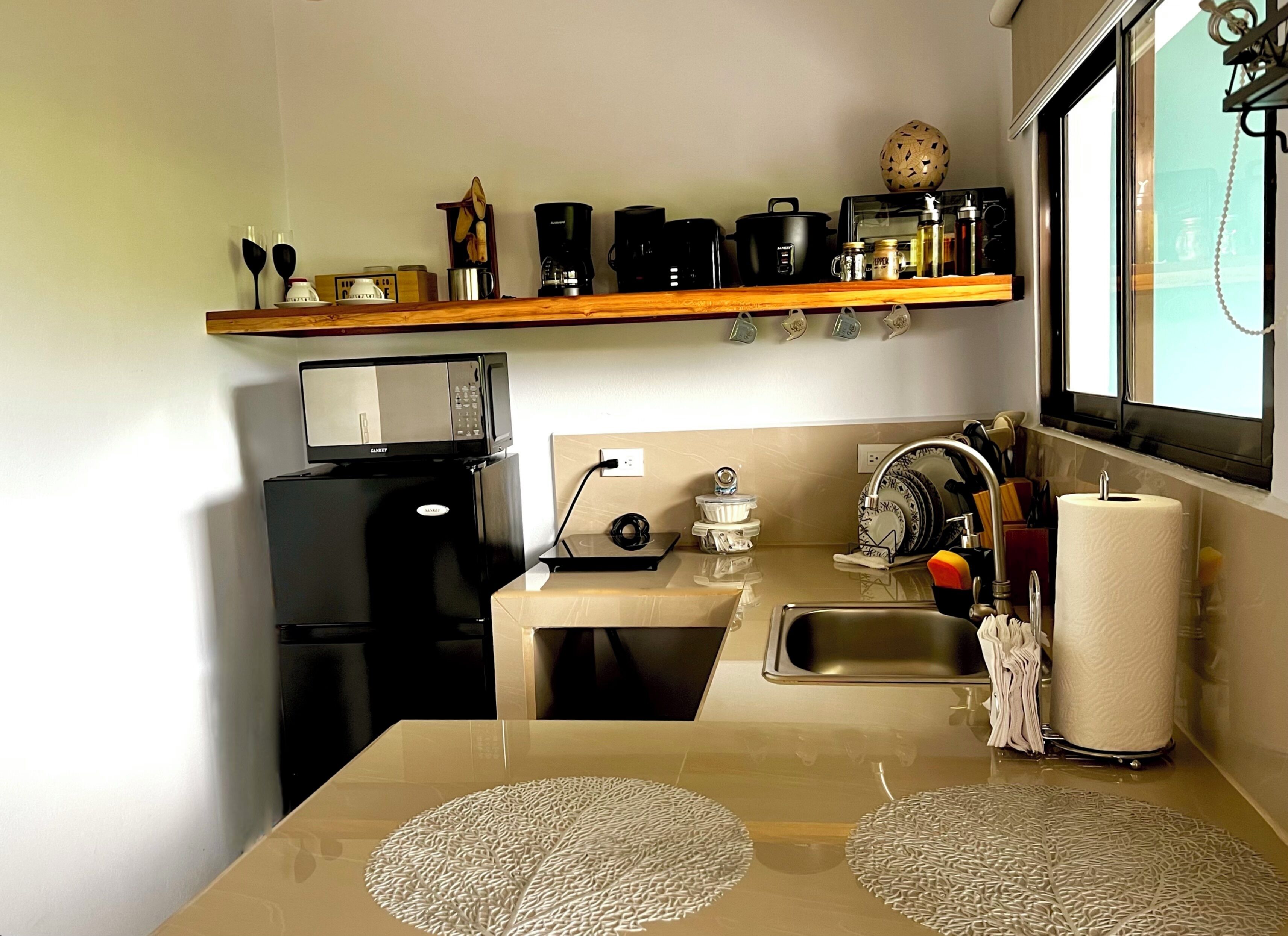 Microwave, coffee/tea maker, electric kettle, cookware/dishes/utensils