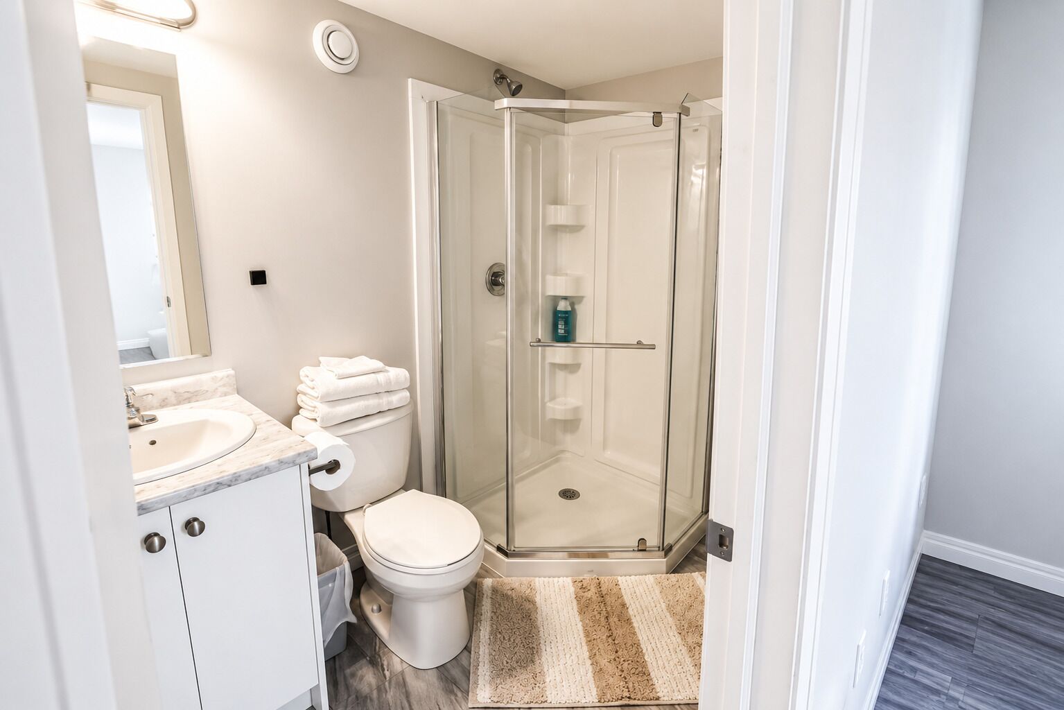 Shower, towels, soap, toilet paper