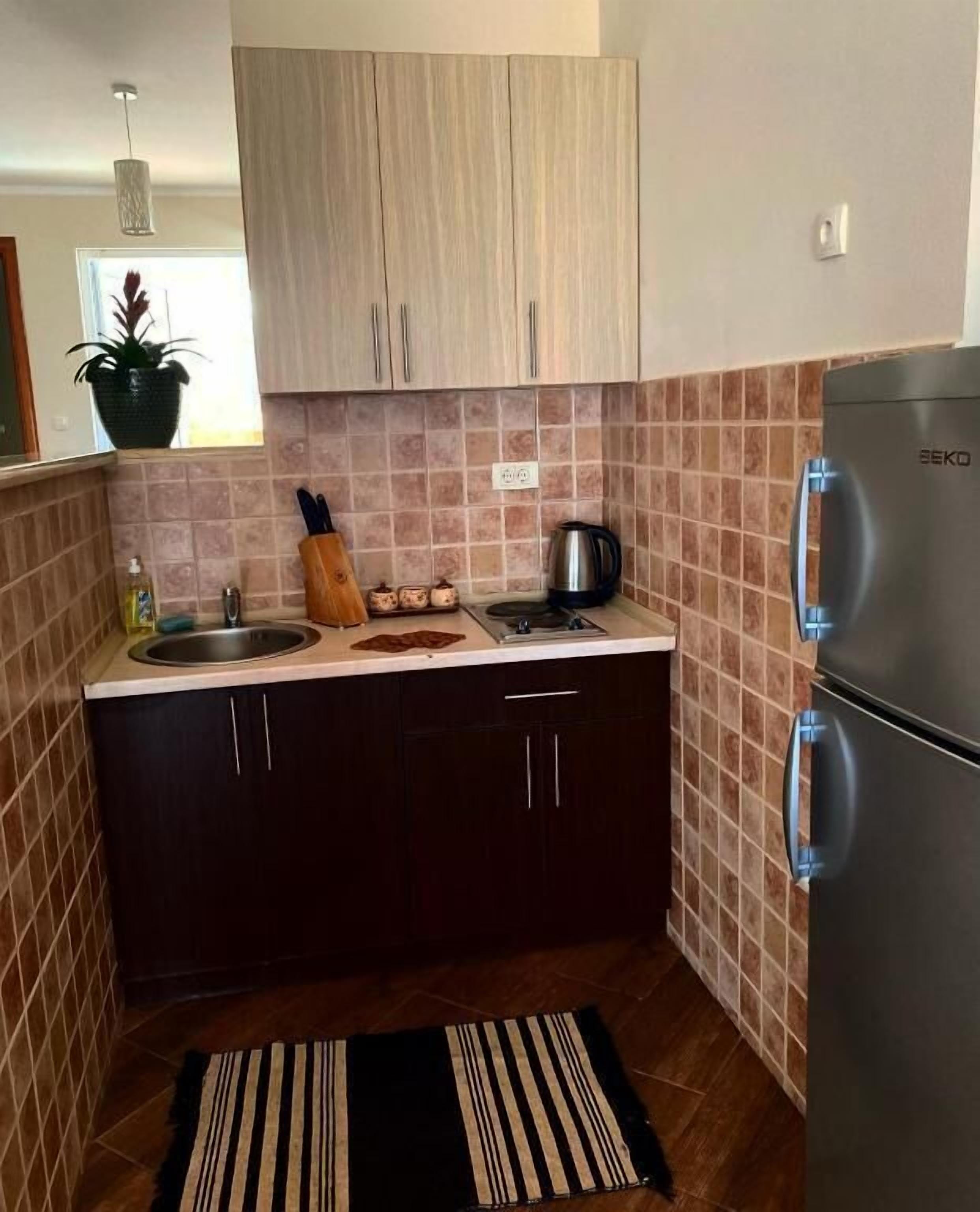 Suite, balcone, vista mare | Cucina privata