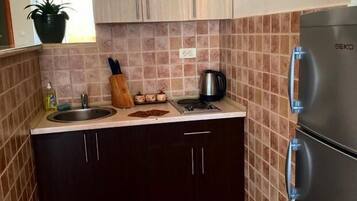 Suite, Balcony, Sea View | Private kitchen