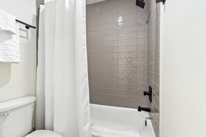 Towels, soap, shampoo, toilet paper - First Floor 3 BR Condo ~ Newly Renovated, Sleeps 8 (Auburn)