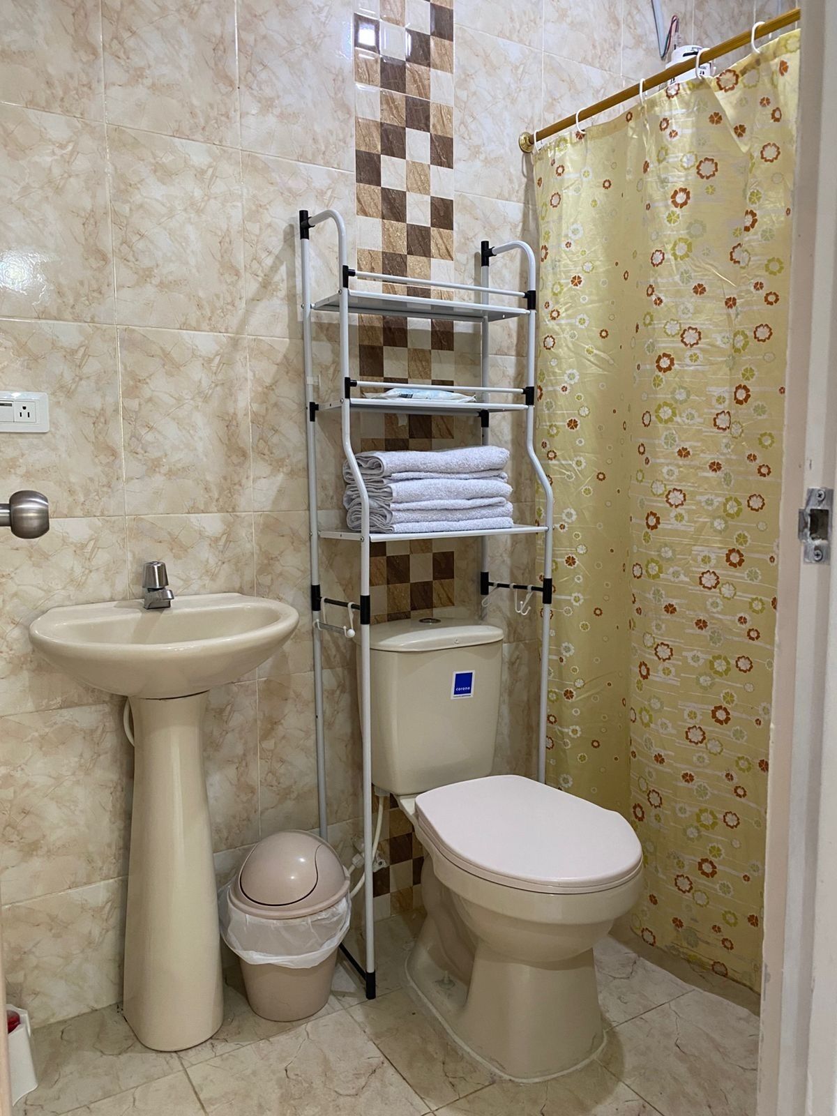 Shower, towels, soap, toilet paper