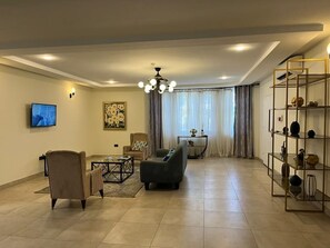 Comfort Condo | Living area - Okailey's Place by Urban Crest (Accra)