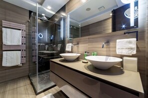 Hair dryer, bidet, towels, soap