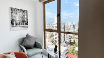 Apartamento empresarial | Frigobar, ferros/tábuas de passar roupa, Wi-Fi de cortesia