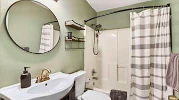 Hair dryer, towels, soap, shampoo