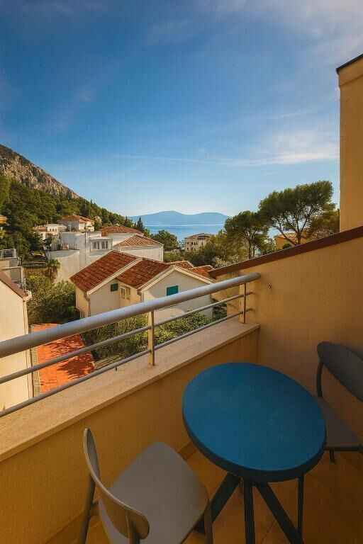 Family Room, 1 Bedroom, Balcony, Partial Sea View | Terrace/patio