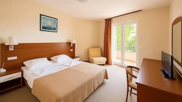 Family Room, 1 Bedroom, Balcony, Partial Sea View | Desk, laptop workspace, soundproofing, free WiFi