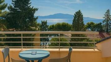 Deluxe Triple Room, Balcony, Sea View | Terrace/patio
