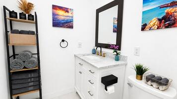 Hair dryer, towels, soap, toilet paper