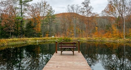 Secluded mountain cabin on 42 wooded acres
pond/game room/Pa. Canyon/rail trail
