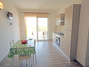 Private kitchen - Neugebaute Wohnung mit Terrasse by Interhome (Capoliveri)