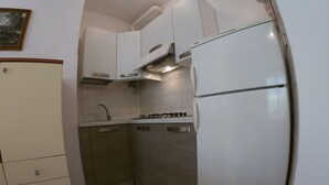 Private kitchen - Wohnung im ersten Stock in der Nähe des Meeres u by Interhome (Rosolina Mare)