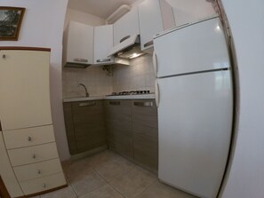 Private kitchen - Wohnung im ersten Stock in der Nähe des Meeres u by Interhome (Rosolina Mare)