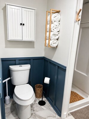 Shower, hair dryer, towels, soap - Ember & Shore is a cozy retreat created for enjoying life’s quieter moments. (Ashville)