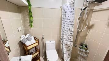 Hair dryer, towels, soap, toilet paper