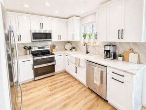 Fridge, microwave, oven, stovetop - Gulf View at Gulf Winds East 12 - Pearl of the Sea~Private Beach Access~Pool (Miramar Beach)