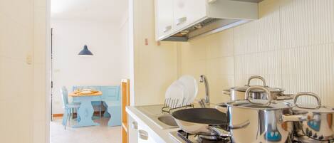 Fridge, microwave, oven, cookware/dishes/utensils