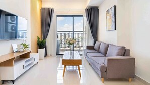 Appartement Supérieur, 3 chambres, balcon, vue ville | Coin séjour