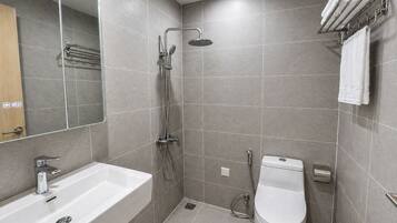Family Room, Balcony | Bathroom | Rainfall showerhead, free toiletries, hair dryer, slippers