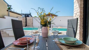 Outdoor dining - Villa Casa Bella by Interhome (Barbariga)