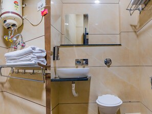 Standard Double Room | Bathroom | Shower, free toiletries, towels, soap - Kanha Shree by Cosmos Hotels (Indore)