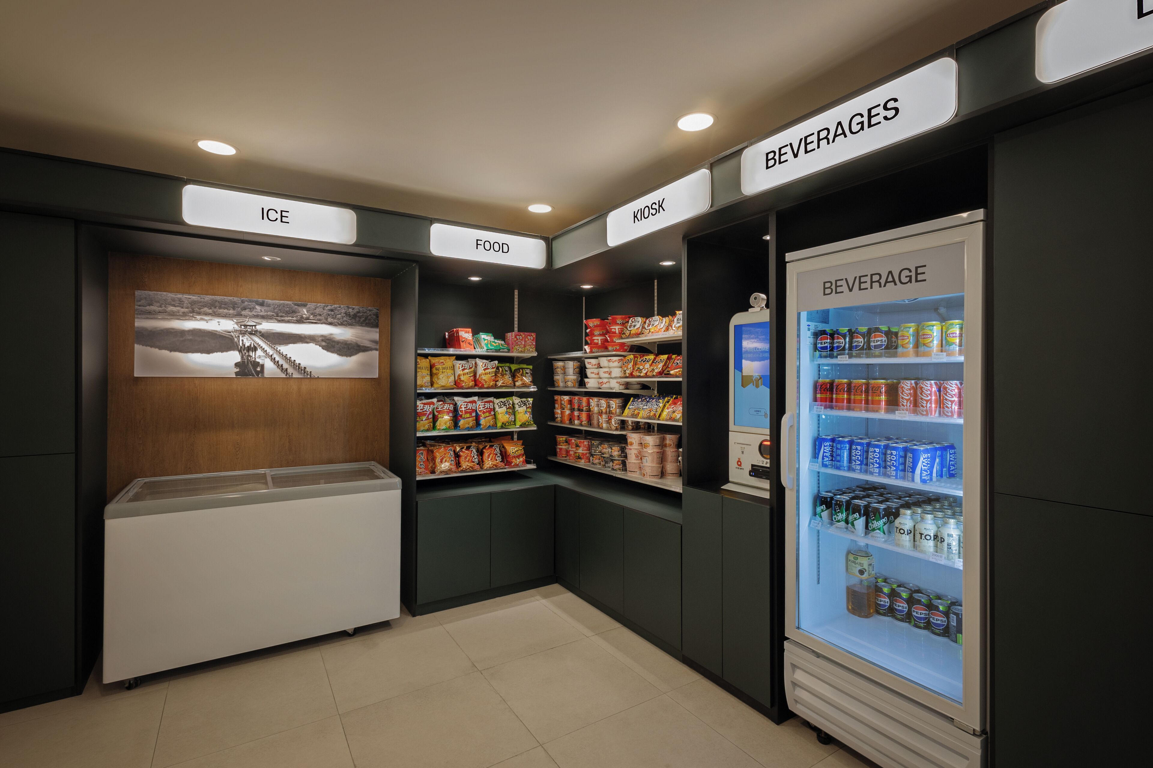 A section of a hotel with labeled areas for ice, food, beverages, and a kiosk.