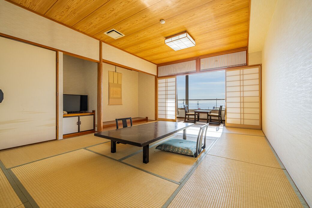 Chambre de style japonais, non-fumeurs, vue partielle sur l'océan | Restauration