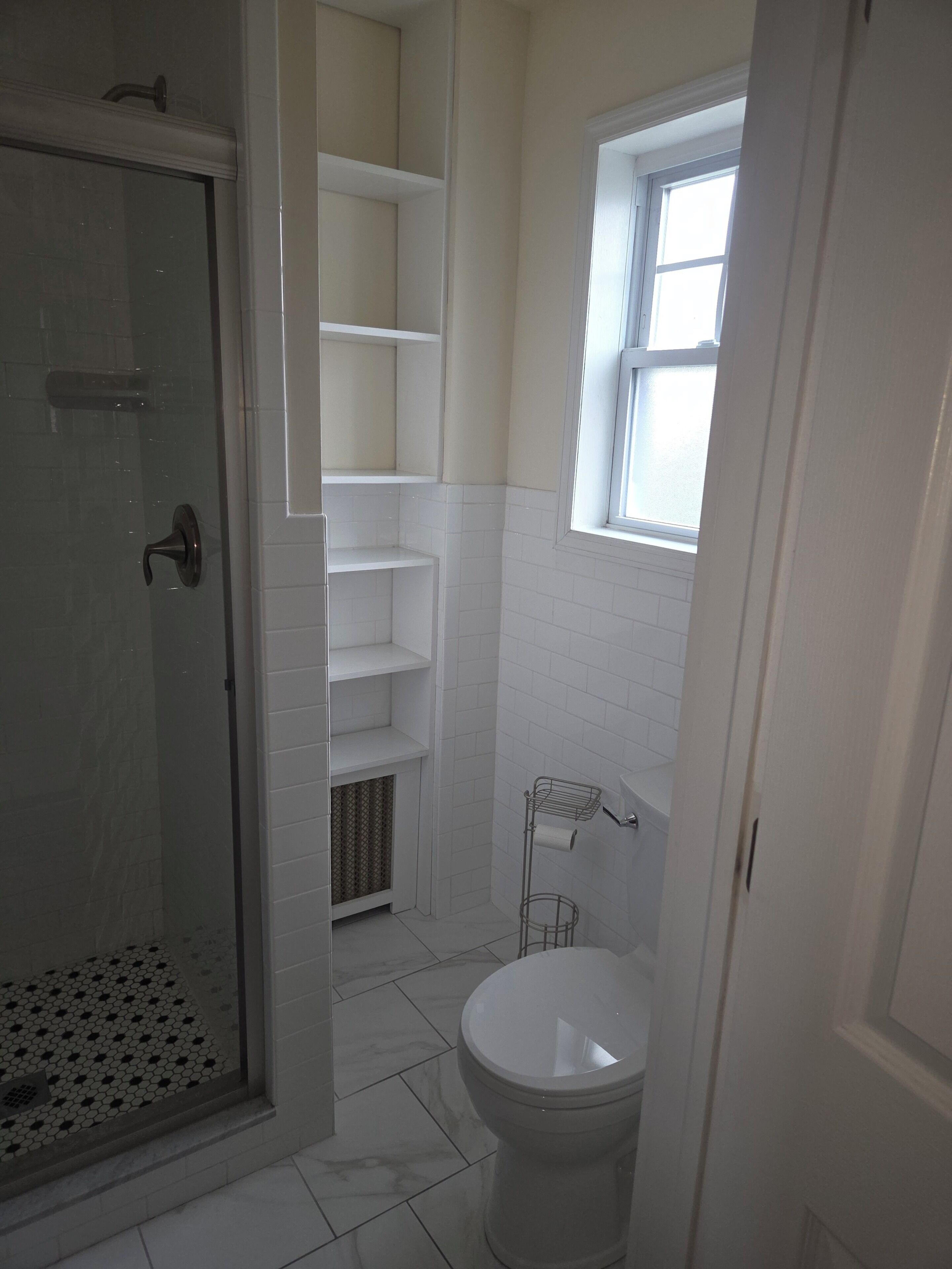 Shower, towels, soap, toilet paper
