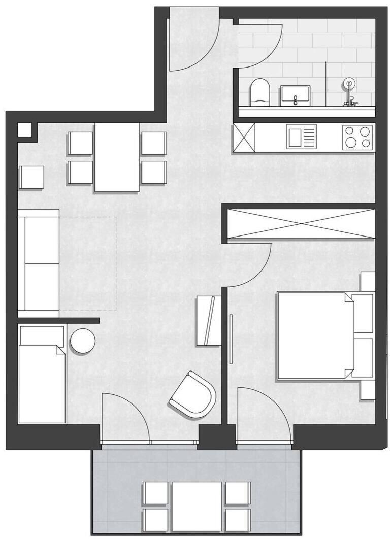 Plano de un cuarto de hotel con kitchenette, baño, zona de estar y un dormitorio independiente.