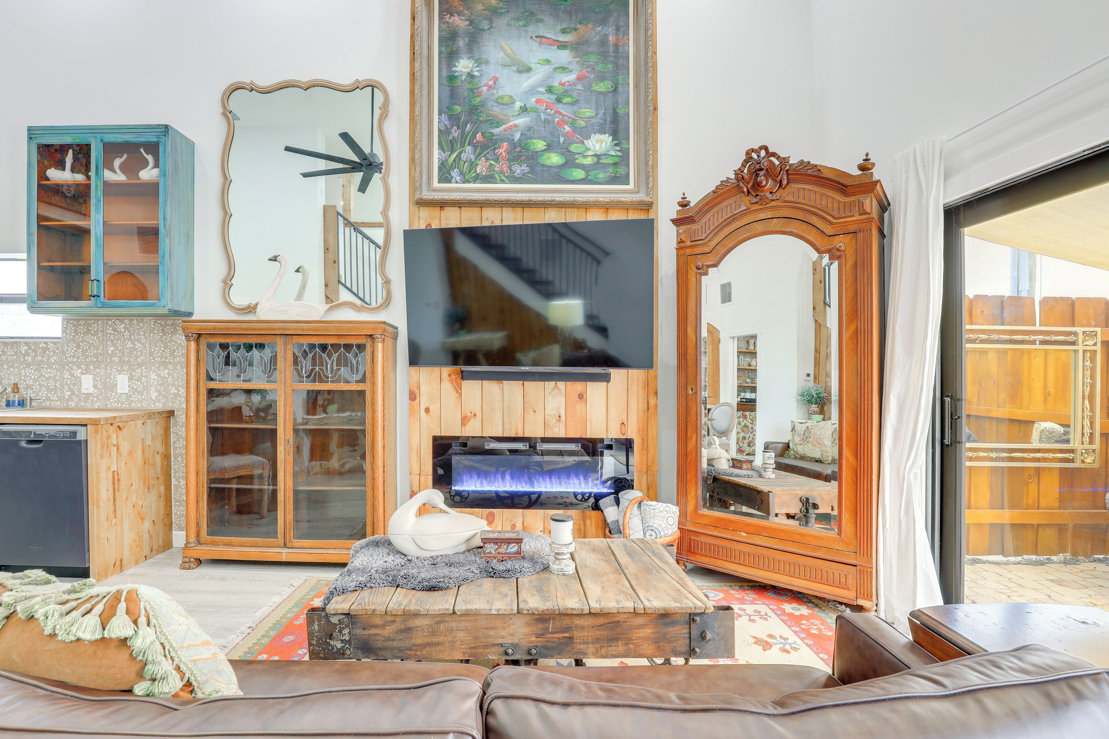 TV, fireplace, books, video library