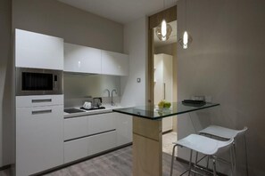 Fridge, microwave, oven, stovetop - Nivasana Residences Vadodara  (VADODARA)