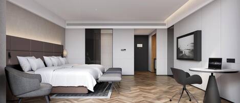 A modern hotel room with a large bed, a desk, and a chair.