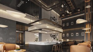 Un interior moderno con una barra central, diferentes disposiciones de asientos e iluminación contemporánea.