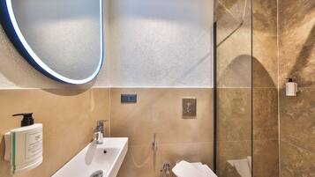Shower, hair dryer, slippers, towels