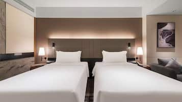 Basic Twin Room | Down duvets, free minibar, individually decorated