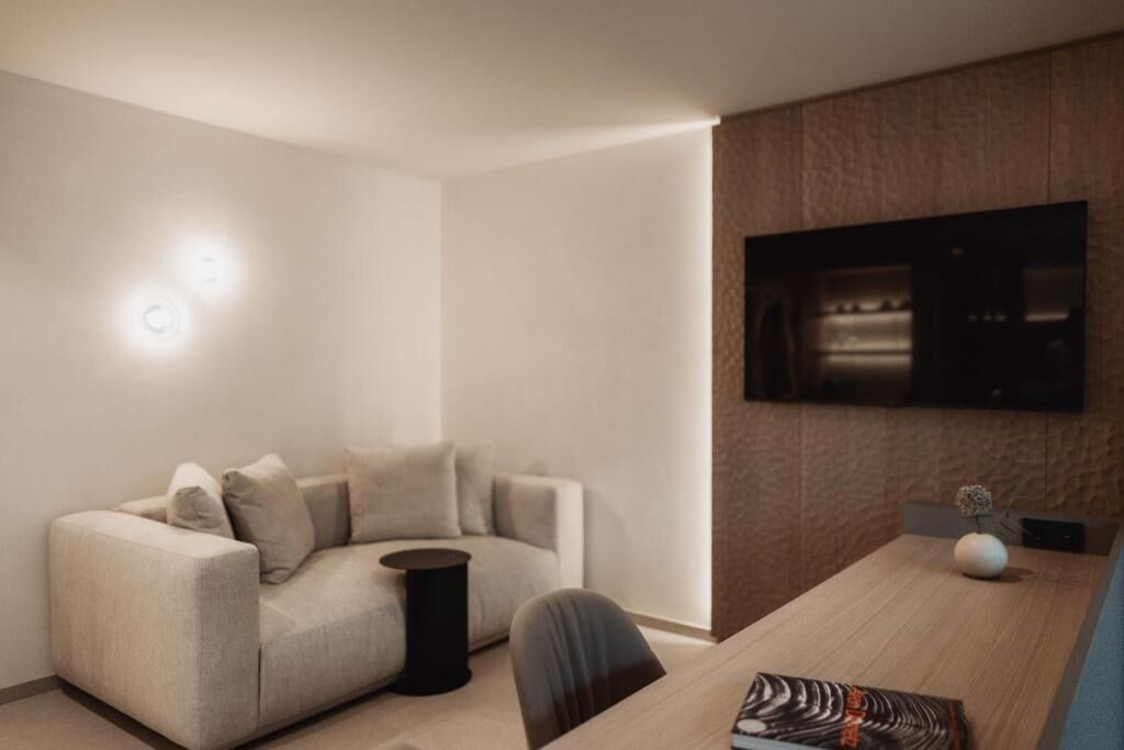 Suite, balcone, vista montagna | Area soggiorno