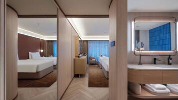 Premium bedding, down duvets, memory-foam beds, free minibar