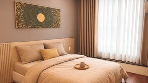 A bedroom with a bed, pillows, a cup on a coaster, a painting on the wall, and a window with curtains. - Peanuts Home Le Lai - Chic Local Stay, Steps to Ben Thanh & Bui Vien (Ho Chi Minh city)