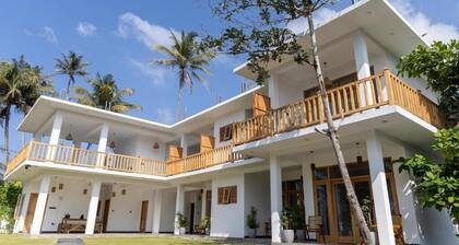 Beach House By Unrushed