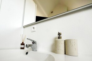 Hair dryer, towels, soap, shampoo
