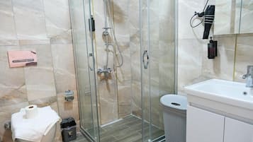Villa | Bathroom | Shower, hair dryer, towels, soap