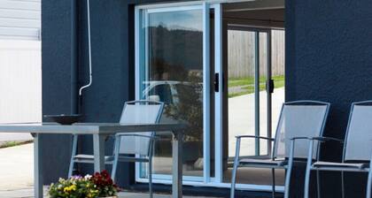 Stylish 1BR Retreat | Patio | Walk to Shops | Parking