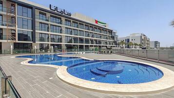 Deluxe Apartment, Balcony, City View | Pool | Outdoor pool