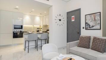 Deluxe Apartment, Balcony, City View | Living area